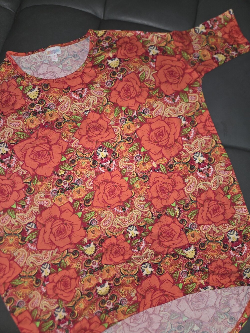 LuLaRoe oversized Irma tunic in vibrant floral and paisley pattern